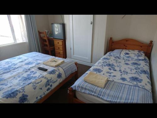 Cama o camas de una habitación en Comfortable Family room with Tv, Free Fast Wifi, Sleeps 3