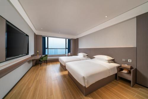 Φωτογραφία από το άλμπουμ του Hidden Foam Hotel Chenzhou Dongjiang Lake Branch σε Liyujiang