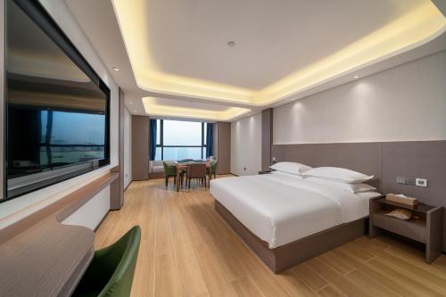 Φωτογραφία από το άλμπουμ του Hidden Foam Hotel Chenzhou Dongjiang Lake Branch σε Liyujiang