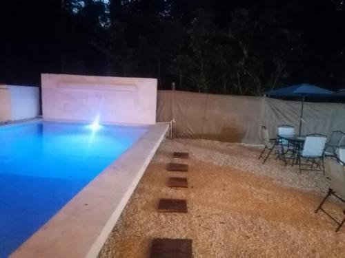 Bazén v ubytování BACALAR INN Hotel nebo v jeho okolí