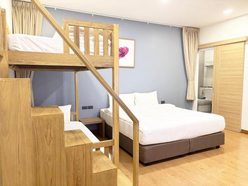 Кровать или кровати в номере Icon Park Hotel, Chiang Mai- SHA Extra Plus