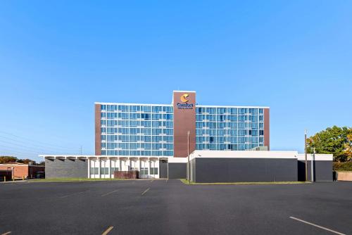 a parking lot in front of a large building at Comfort Inn & Suites Omaha Central in Omaha