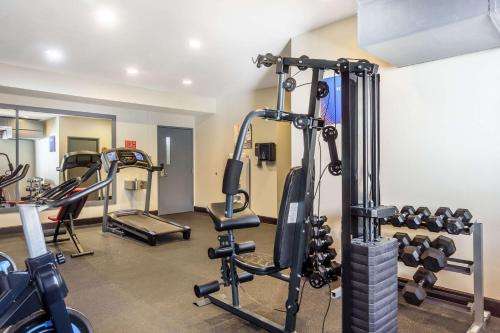 a gym with treadmills and machines in a room at Comfort Inn Federal Way - Seattle in Federal Way