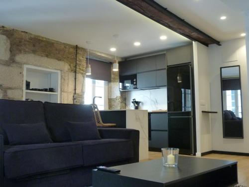 Η κουζίνα ή μικρή κουζίνα στο Foroplaza Duplex