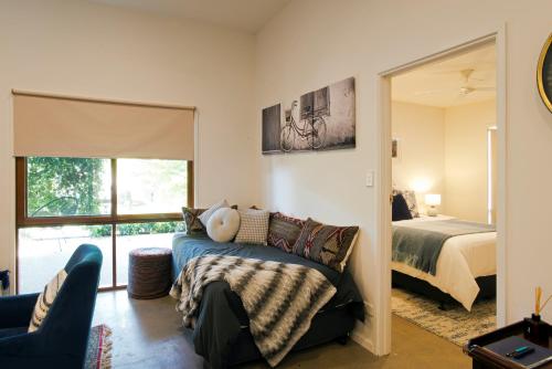 Ένα ή περισσότερα κρεβάτια σε δωμάτιο στο Omaroo High Country Retreat