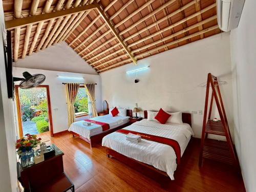Postel nebo postele na pokoji v ubytování Tam Coc Friendly Homestay