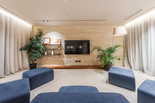 Jerina Mansionにあるテレビまたはエンターテインメントセンター