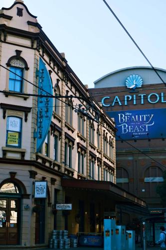 a building with a sign on the side of it at Metro Hotel Marlow Sydney Central in Sydney