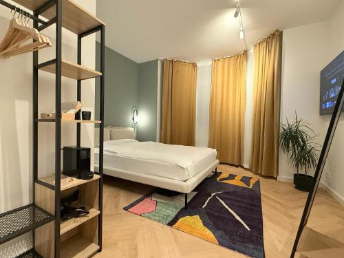 Ένα ή περισσότερα κρεβάτια σε δωμάτιο στο Stayzz by Homyzz