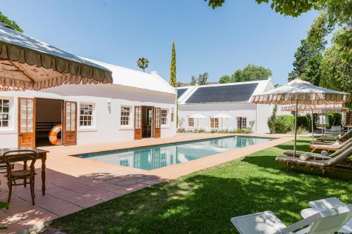 an image of a house with a swimming pool at De Bergkant in Prince Albert