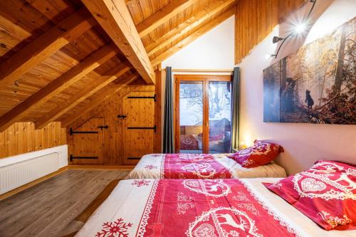 Ένα ή περισσότερα κρεβάτια σε δωμάτιο στο Chalet Colenfrey - Valloire
