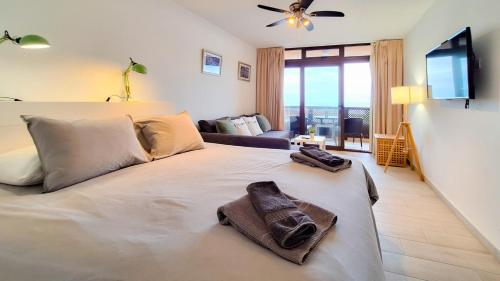 Postel nebo postele na pokoji v ubytování Studio with balcony and sea view