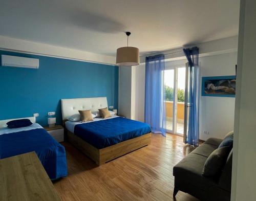 Postel nebo postele na pokoji v ubytování B&B e Apartment MARIA VITTORIA - Anzio Blue Horizon - 150 mt dal mare