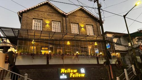 a building with lights on top of it at Mellow Fellow Hostel Darjeeling in Darjeeling