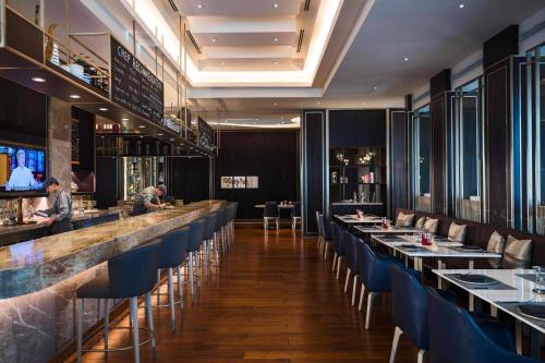 TV a/nebo společenská místnost v ubytování Renaissance Suzhou Hotel