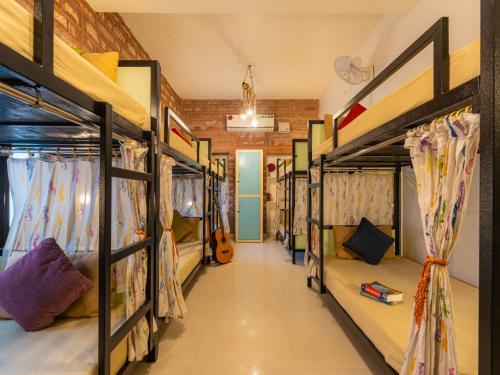 a row of bunk beds in a room at Moustache Jodhpur in Jodhpur