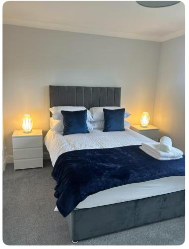 Ένα ή περισσότερα κρεβάτια σε δωμάτιο στο Modern staycation Apartment