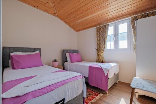 Postel nebo postele na pokoji v ubytování Sedir Duo
