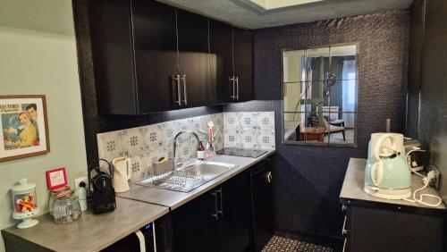 Køkken eller tekøkken på Grand Studio de charme Rouen centre