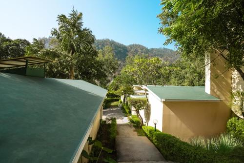 a view of a house with a green roof at The Solluna Resort in Marchula