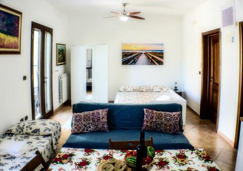 Ένα ή περισσότερα κρεβάτια σε δωμάτιο στο SHANTI HOME Salento