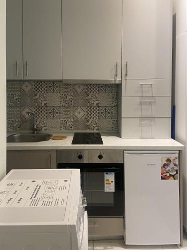 Η κουζίνα ή μικρή κουζίνα στο Stylish modern flat downtown