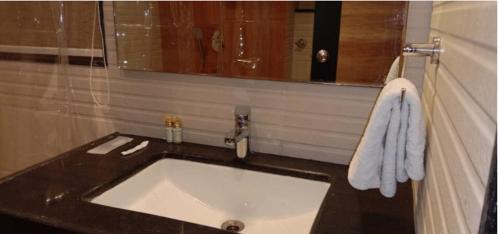Koupelna v ubytování TGN SUITES - HOTEL