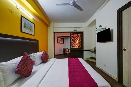 Ένα ή περισσότερα κρεβάτια σε δωμάτιο στο Hotel Bijwasan Near Yashobhomi