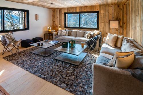 a living room with a couch and a table at La Superba in Allos