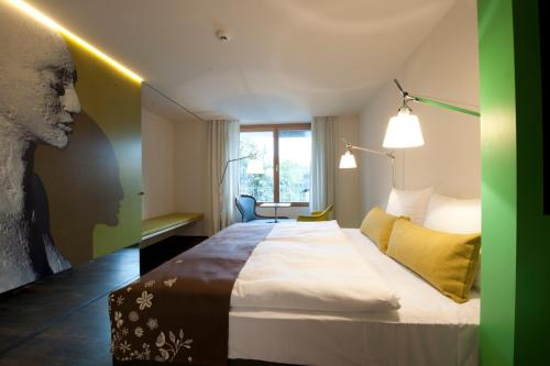Postel nebo postele na pokoji v ubytování Nala Individuellhotel