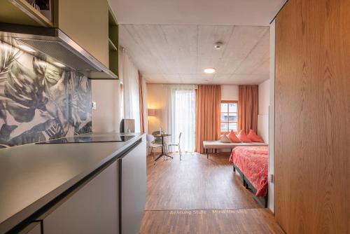Posteľ alebo postele v izbe v ubytovaní pradl elf my- apartment