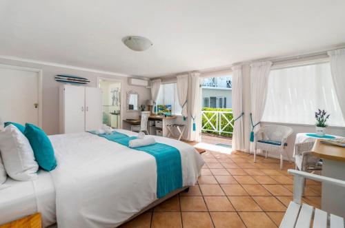 Ένα ή περισσότερα κρεβάτια σε δωμάτιο στο Brenton Beach House