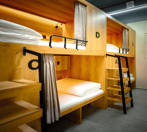 Postel nebo postele na pokoji v ubytování Gusti Bed & Breakfast Singapore