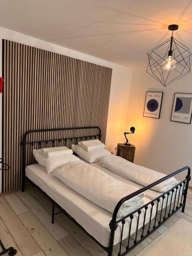 two beds sitting next to each other in a room at JonnysChillOutLounge in Osnabrück