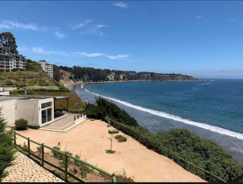 a view of a beach with the ocean at Casa Condominio Costa Quilén in Puchuncaví