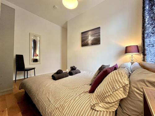 a bedroom with a bed in a room at Modernised 3-bed home in Bamber Bridge, Preston in Bamber Bridge