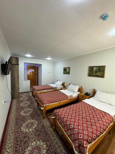 Llit o llits en una habitació de Karvonsaroy Hotel