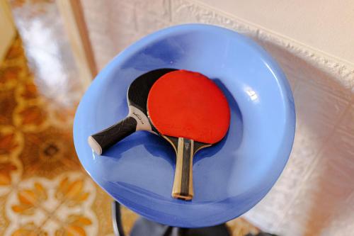 a blue helmet with a tennis racket in it at A 5 minuti da Lecce - DOMUS ANTIQUA in Lizzanello