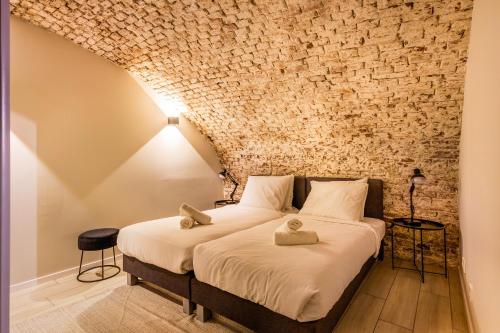 Ένα ή περισσότερα κρεβάτια σε δωμάτιο στο Beautiful canal apartment in Utrecht for 4 persons