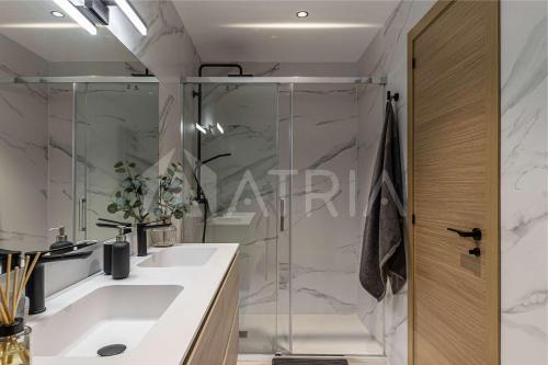 a bathroom with a shower and a sink at Designer apartment 2 in Madrid