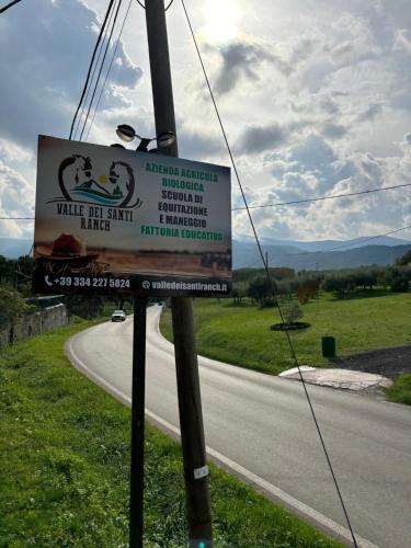 a sign on the side of a road at P&P nella natura in Cassino