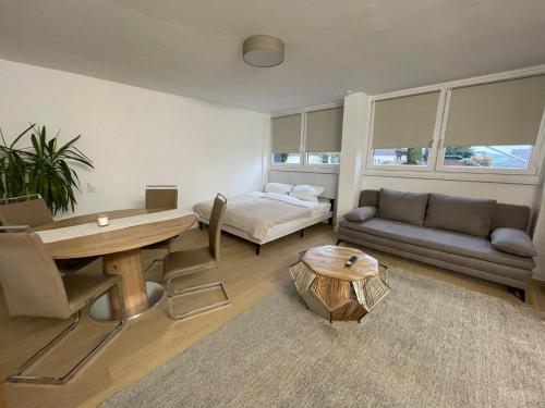 Postel nebo postele na pokoji v ubytování Boardinghouse 44