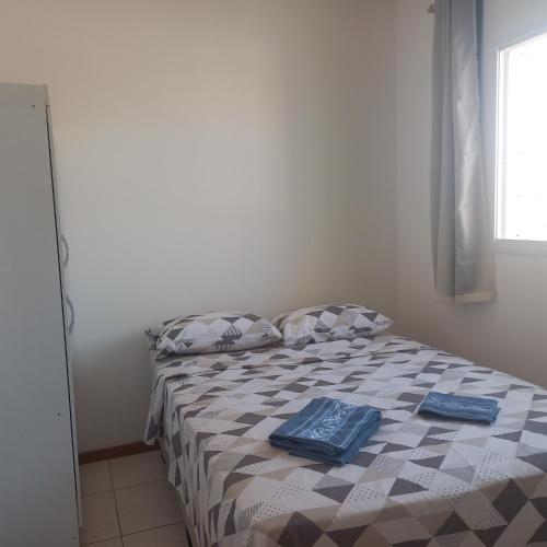 Ένα ή περισσότερα κρεβάτια σε δωμάτιο στο Quarto Nº 2 Taguatinga Sul garagem wi-fi - 1 a 2 hospedes sem taxas