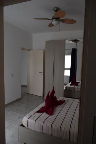 Ένα ή περισσότερα κρεβάτια σε δωμάτιο στο SGC Boa Vista Apartments