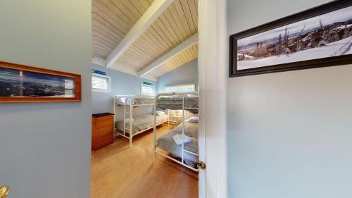 Ένα ή περισσότερα κρεβάτια σε δωμάτιο στο Silver Spring Chalet Brought to you by GetAway Vacations