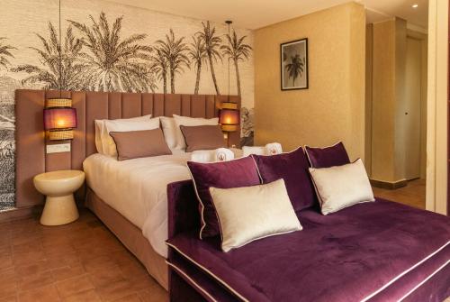 Ένα ή περισσότερα κρεβάτια σε δωμάτιο στο JW Marrakech Domaine d'Exception