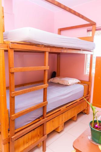 a bunk bed in a room at Quarto Residencial Dubai - Lazer Completo in Brasília