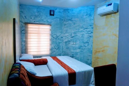 Postel nebo postele na pokoji v ubytování Hotel Diego