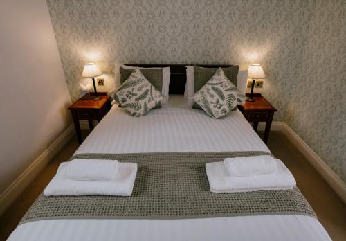 Letto o letti in una camera di The Old Palace Lodge
