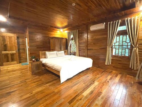 Кровать или кровати в номере Ong An House - Where serenity meets nature